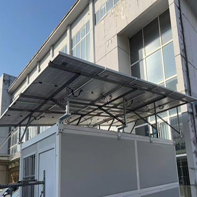 Folding cabin with solar panel canopy